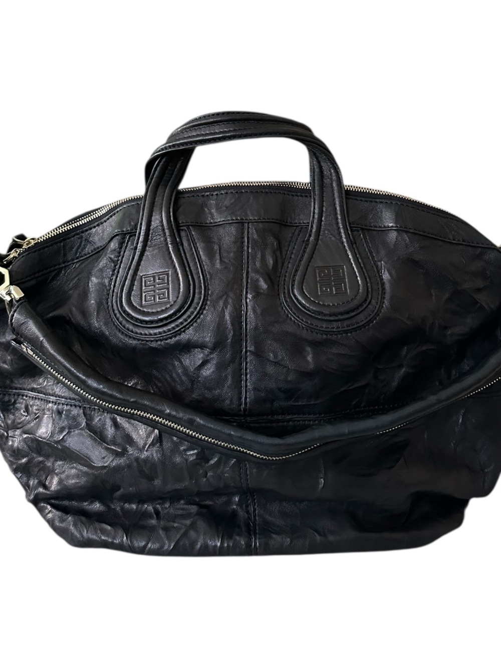 Givenchy Sheepskin Large
Nightingale Black Handbag with Gold toned hardware.